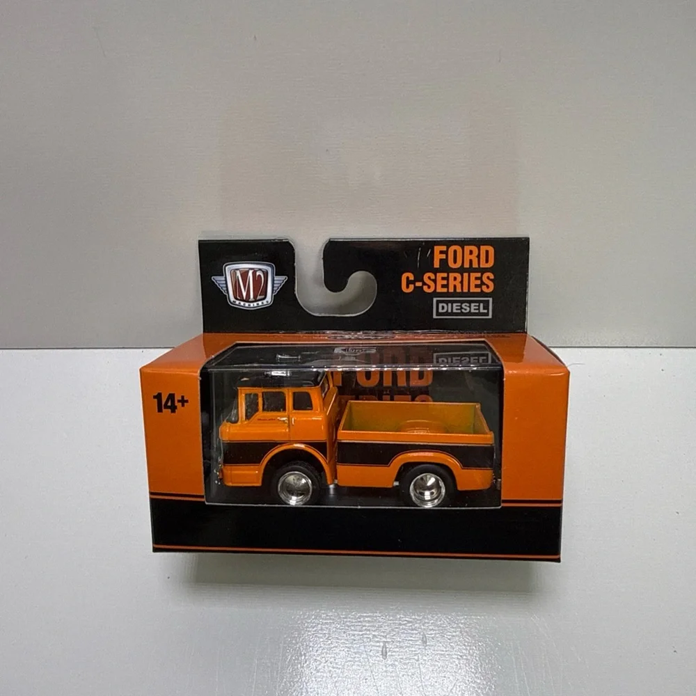 Machine Ford C-Series Diecast Truck - Orange & Black